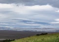 Panorama with mountain range, glacier tongue of Vatnajokull glacier and green vegetation, South Iceland Royalty Free Stock Photo