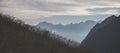 Panorama of the mountain range and slopes of the mountains in the early morning in the mountains of the Caucasus Royalty Free Stock Photo