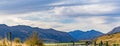 Panorama Mountain range of the Southern Alps, Lake Wanaka, at Dublin Bay, in Wanaka, Otago, South Island, New Zealand Royalty Free Stock Photo