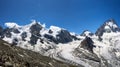 Panorama of a mountain ridge with Ober Gabelhorn and Dent Blanche peaks of Swiss Alps