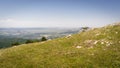 Panorama in a mountainous area in summer. Landscape with mountains, hills and cliffs. Royalty Free Stock Photo