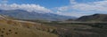 Panorama of the mountains. Magnificent views of the Altai mountains of red against the blue sky. Siberia, Altai