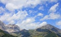Panorama with mountains, meadows, sky and clouds Royalty Free Stock Photo
