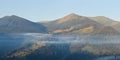 Panorama of mountains at misty sunrise Royalty Free Stock Photo