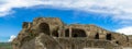 Panorama of mountains and prehistoric ruins of 3,000 years old cave-dwelling town,palace of Tamara in Uplistsikhe Royalty Free Stock Photo