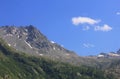 Panorama with mountains, rocks, clouds and vegetation Royalty Free Stock Photo