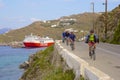 Panorama of Mykonos port and cyclists, Greece