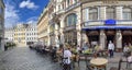Panorama narrow streets of the Riga Old Town with open-air cafes