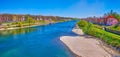 Panorama of Ticino river with small residential houses on its banks in Pavia city, Italy Royalty Free Stock Photo