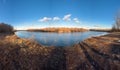 Panorama of nature in early spring. river in the sun, cloudy blue sky at sunset Royalty Free Stock Photo