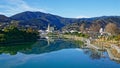 Panorama of Nelson City, reflected in the Maitai River, New Zealand