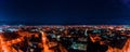 Panorama of night aerial view of the city of Ivano-Frankivsk, bright lights from cars and night lighting of the city Royalty Free Stock Photo