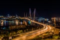 Panorama of night Vladivostok. The bridge through a bay Golden Horn. Royalty Free Stock Photo