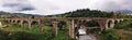 Panorama of the old austrian bridge through the river at the Karpatian mountains view from left middle side Royalty Free Stock Photo