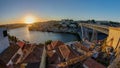 Panorama of old city Porto at river Duoro,with Port transporting boats at sunset timelapse, Oporto, Portugal Royalty Free Stock Photo