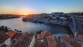 Panorama old city Porto at river Duoro,with Port transporting boats at sunset timelapse, Oporto, Portugal Royalty Free Stock Photo