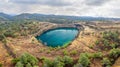 Panorama of old copper mining area with lake and mine tailings