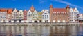 Panorama of old houses and city gate at the Motlawa river in Gdansk Royalty Free Stock Photo