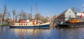 Panorama of old ships in the canal of Meppel