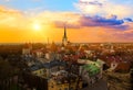 Panorama of old town of Tallinn, Etonia. Tallinn city wall and a view of the Church of St. Olaf. The skyline of the old town, suns Royalty Free Stock Photo