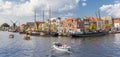 Panorama of old wooden ships in the central canals of Leiden Royalty Free Stock Photo