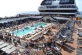 Panorama of the open deck with a luxurious pool and numerous tourists ship MSC Meraviglia, October 10, 2018