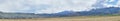 Panorama of Oquirrh Mountain range which includes The Bingham Canyon Mine or Kennecott Copper Mine, rumored the largest open pit c Royalty Free Stock Photo