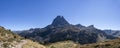 Panorama of Ossau Valley with Pic du Midi d`Ossau mountain, Pyrenees National Park, France Royalty Free Stock Photo