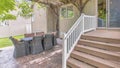 Panorama Outdoor patio with wooden pergola roof with vines and string lights Royalty Free Stock Photo