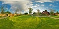 Panorama outside vacation wooden village home in sunny evening day . Full 360 degree seamless panorama in equirectangular