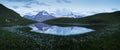 Panorama over the Bachalpsee during the famous hiking trail from First to Grindelwald Bernese Alps, Switzerland.