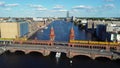 ship steamer and 2 railroads cross each other on Bridge. Calm aerial view flight