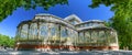 Panorama of Palacio de Cristal Glass Palace in Buen Retiro Park in Madrid, Spain