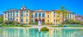 Panorama of Palazzo Dugnani in Public Park of Montanelli with a pond with fountain, Milan, Italy
