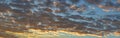 Panorama or panoramic dramatic blue sky and warm light clouds at sunrise or sunset on morning or evening time for background or ba Royalty Free Stock Photo