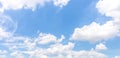 Panorama or panoramic photo of blue sky and white clouds or cloudscape. Royalty Free Stock Photo