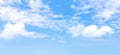 Panorama or panoramic photo of blue sky and white clouds or cloudscape. Royalty Free Stock Photo