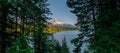 Panorama peering through trees to see Lost Lake and Mount Hood Royalty Free Stock Photo