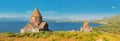 Panorama from peninsula viewpoint to Sevanavank Monastery and chapel overlooking famous Sevan lake at sunny weather