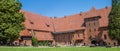 Panorama of people in the courtyard of castle Malbork