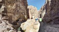 Panorama of people near Al Khazneh or the Treasury at ancient Petra