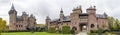 Panorama photo of Castle De Haar with the castle on the left and the ChÃÂ¢telet with entrance gate on the right