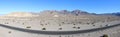 Panorama photo of the great landscape of Death Valley with dramatic cloudy sky. Desert. USA, California Royalty Free Stock Photo