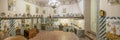 A panorama photo of the kitchen in the Museo Nacional de Ceramica in Valencia, totally full of ceramic utensils and images, Spain Royalty Free Stock Photo