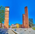 Panorama of Piazza Leonardo da Vinci with its medieval towers, Pavia, Italy Royalty Free Stock Photo