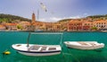 Panorama of picturesque town Pucisca in Croatia, Island Brac, Europe. Pucisca town mediterranean panorama with seagull's flying