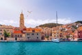 Panorama of picturesque town Pucisca in Croatia, Island Brac, Europe. Pucisca town mediterranean panorama with seagull's flying