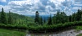 Panorama of polish mountains surrounded with greenery and clouds from PTTK located in Beskid SÃâ¦decki in the Radziejowa Range near