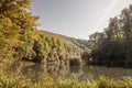 Panorama of the pond Jankovac, a small water lake surrounded by trees and forest in the Papuk mountain, a major national park of