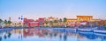 Panorama of pond and pavilions of Global Village Dubai at sunset, on March 6 in Dubai, UAE Royalty Free Stock Photo